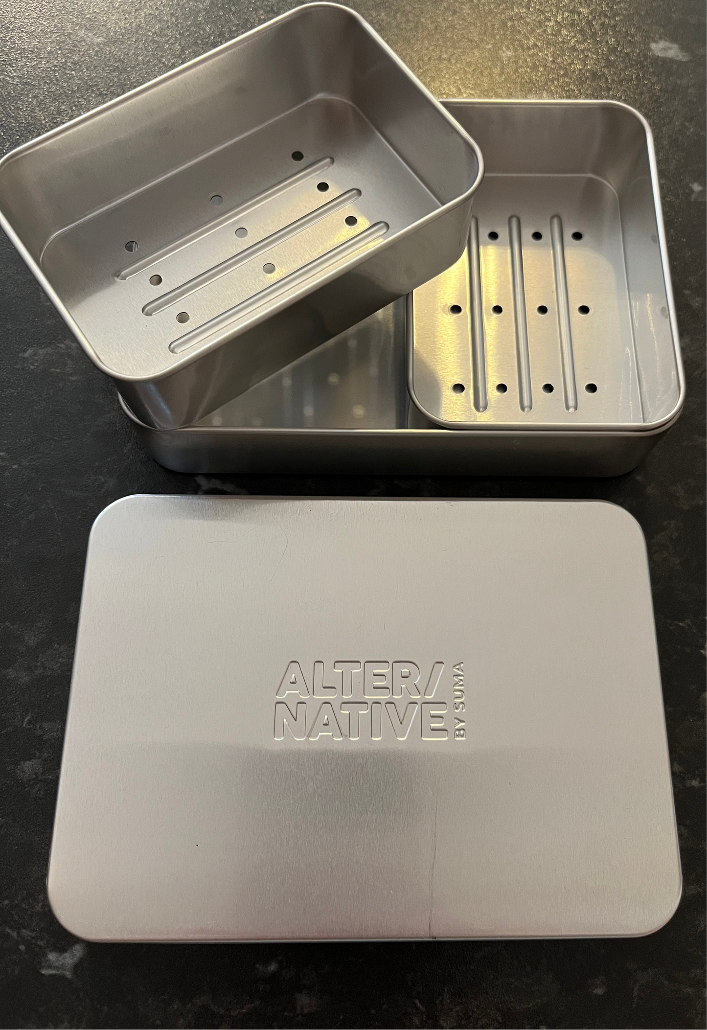 The inside of Alter/Native’s double soap tin.