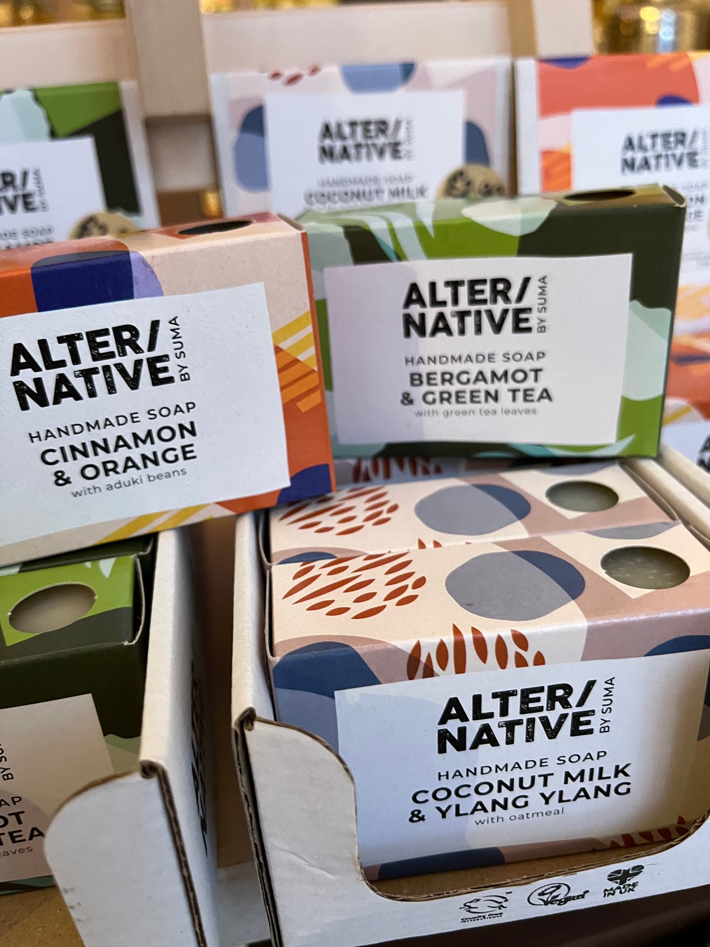 Two boxes of Alter/Native soap bars, Cinnamon and Orange, and Bergamot and Green Tea.
