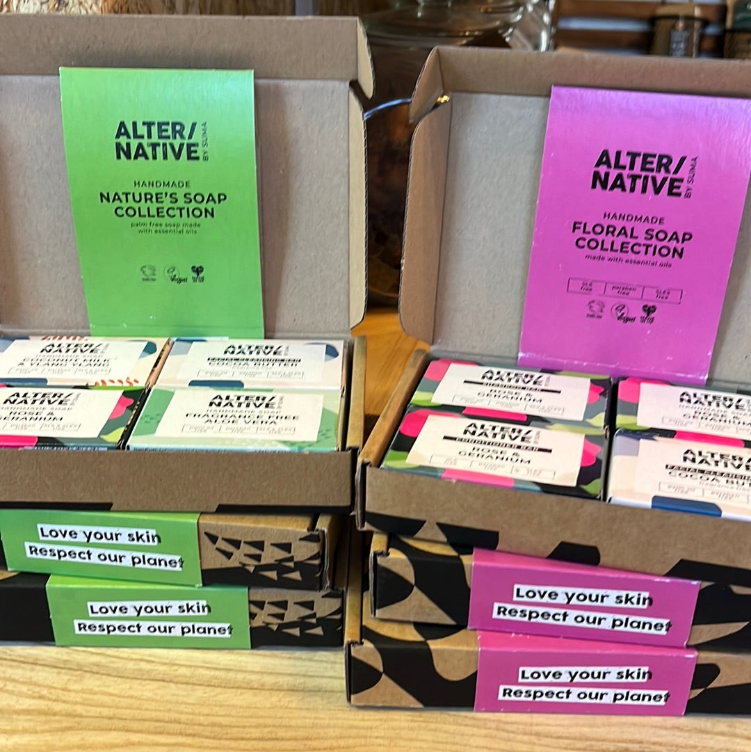 Two opened boxes of Alter/Native Gift Sets, Nature’s Soap Collection and Floral Soap Collection.
